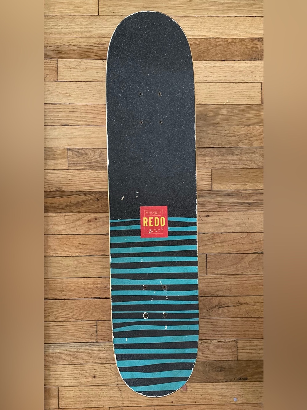 The ReDo Skateboard Co. Stoked Pop Green Monster Complete Board 31x7.6